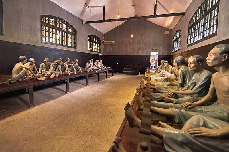 Inside Hoa Lo Prison are statues depicting Vietnamese prisoners