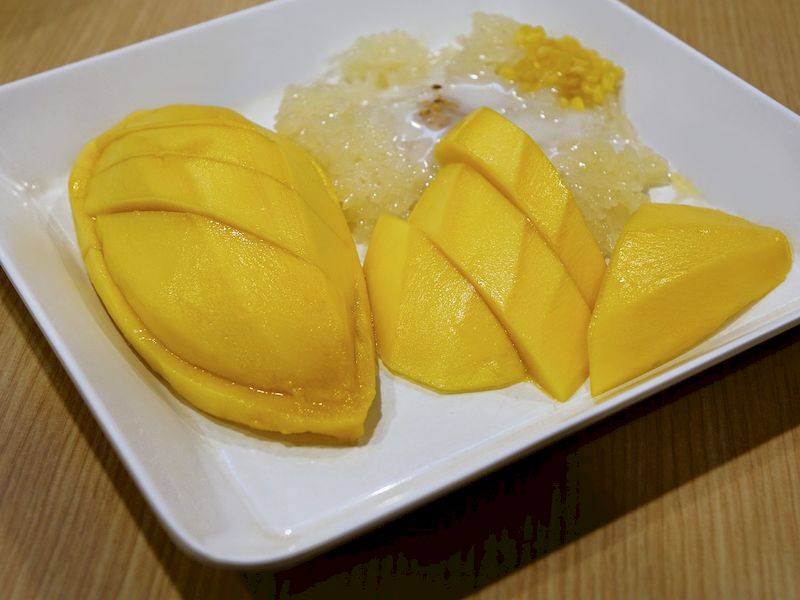 El mango de Tailandia se agregan en muchos platos típicos 