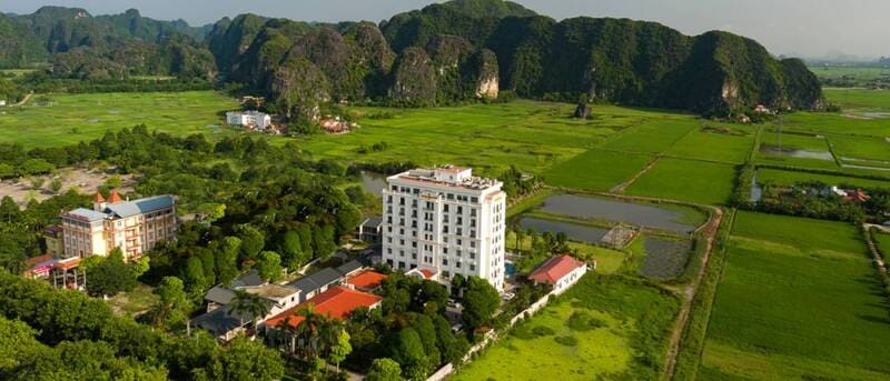 Ninh Binh Hidden Charm Hotel & Resort is the white building, in the heart of nature