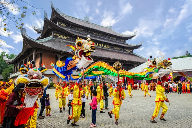 Dragon dancing, a tourist-attracting activity at the Bai Dinh Pagoda Festivals in Vietnam