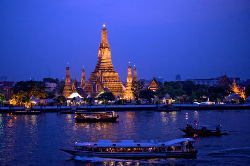 Night scene of Chao Phraya river with Bangkok cityscape