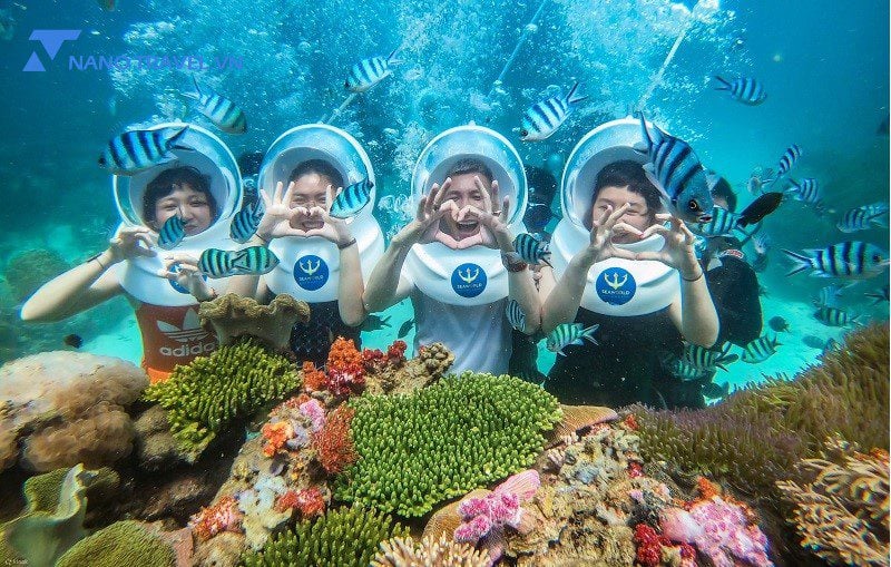 Tourists enjoy the underwater walking experience