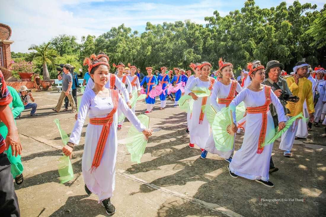 Group singing and dancing with traditional Cham songs