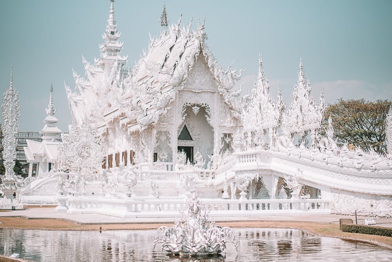 The White Temple (Wat Rong Khun) is a symphony of eye-catching design and religious art