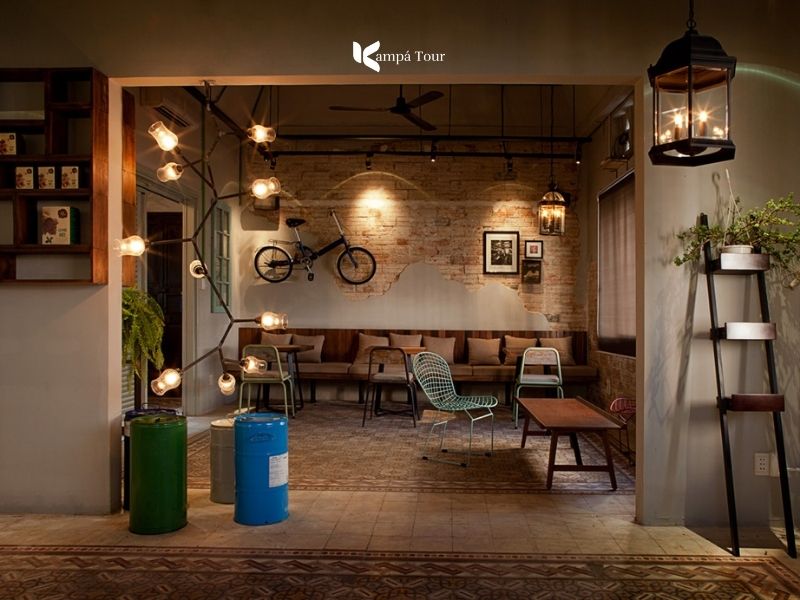 Tiled floor, vintage memorabilia and large tables inside Bang Khuang Cafe