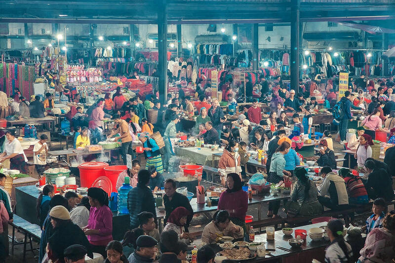 Bustling scene inside Meo Vac market