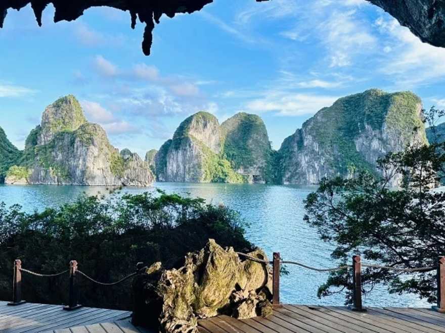 Halong Bay in September with cloudy sky and limestone islands