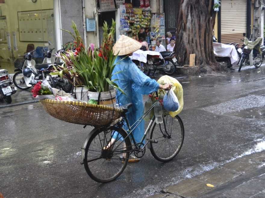 Hanoi August weather with cloudy sky and wet streets
