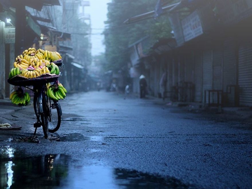 Hanoi September weather with cloudy sky and wet streets