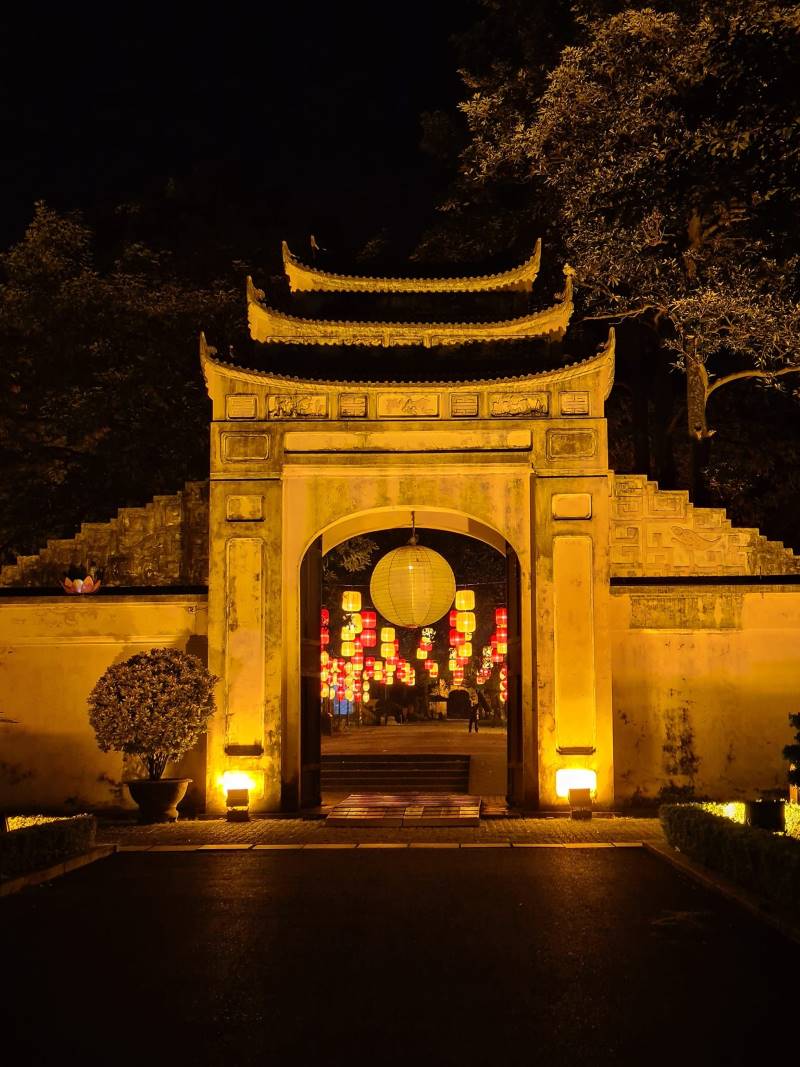 The Thang Long Imperial Citadel shines brilliantly and mystically under the glow of lights.