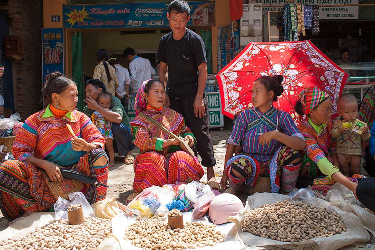 Ethnic woman on sunday market