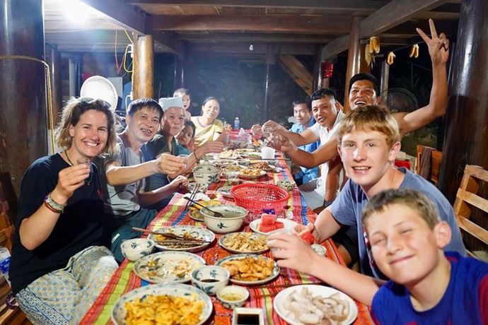 Our dear travellers having dinner at local homestay
