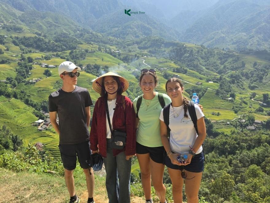 A Kampá Tour guide and travelers on a journey to explore Sapa.