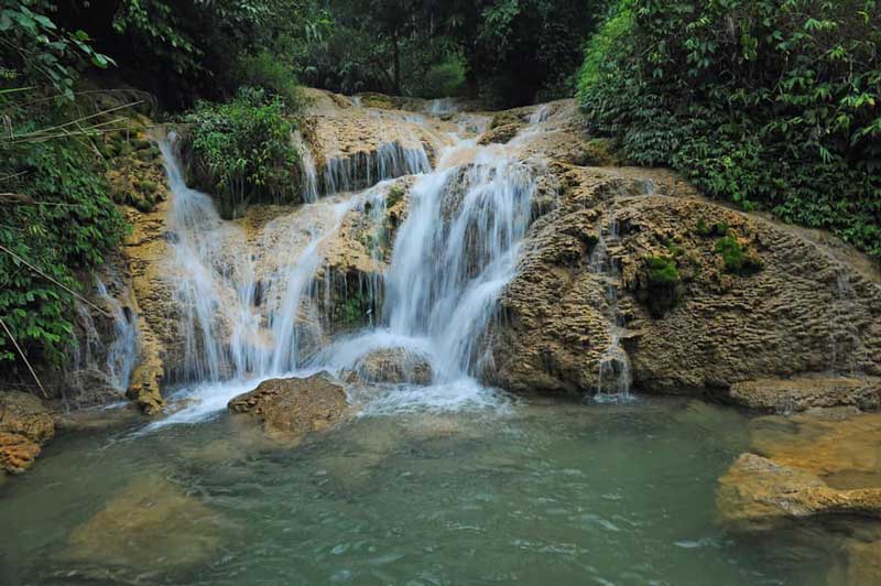 Hieu waterfall from the village of Hieu