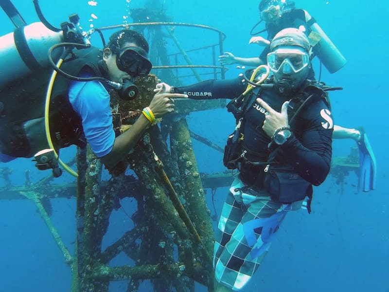 Diving to explore the wreck of HTMS Chang