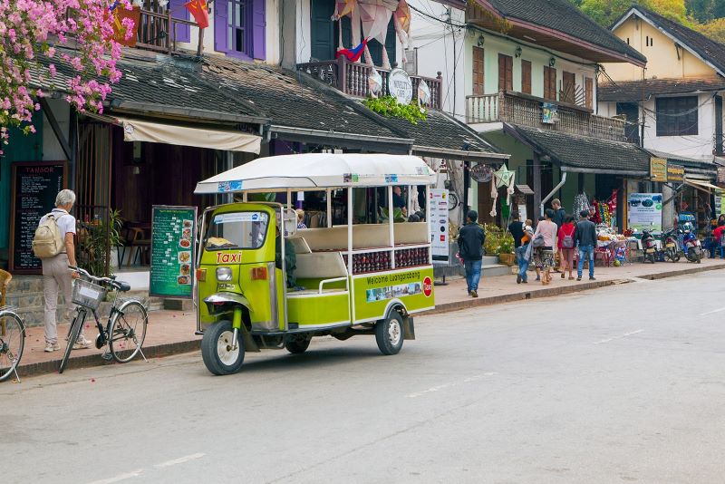 In most towns in Laos, this small three-wheeled vehicle serves as a taxi