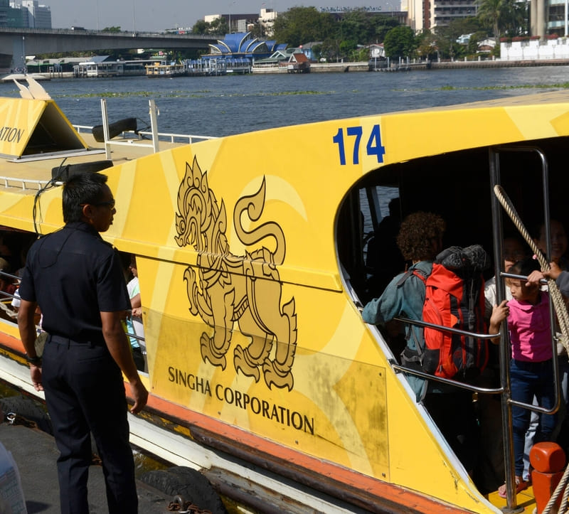 Tourist boat with advertisement for Singha beer