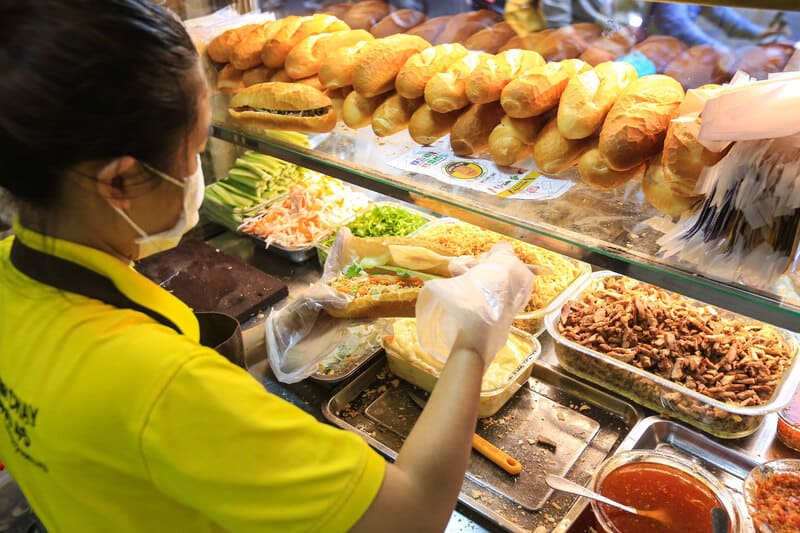 Banh mi, an iconic street food from Vietnam, is not to be missed on your trip to Vietnam!