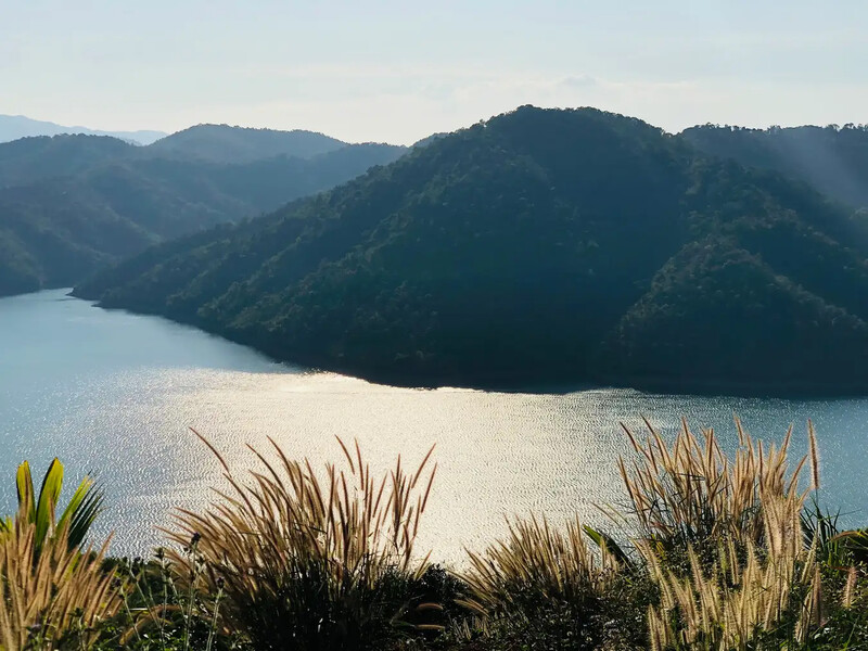 Sunset afternoon view of hydroelectric lake from above