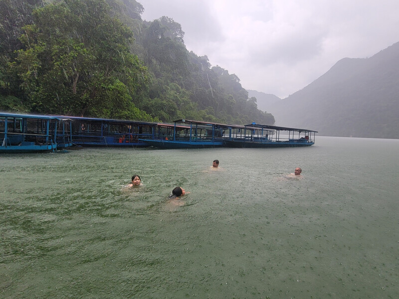 Our tourists swim at Ba Be Lake in the rain!