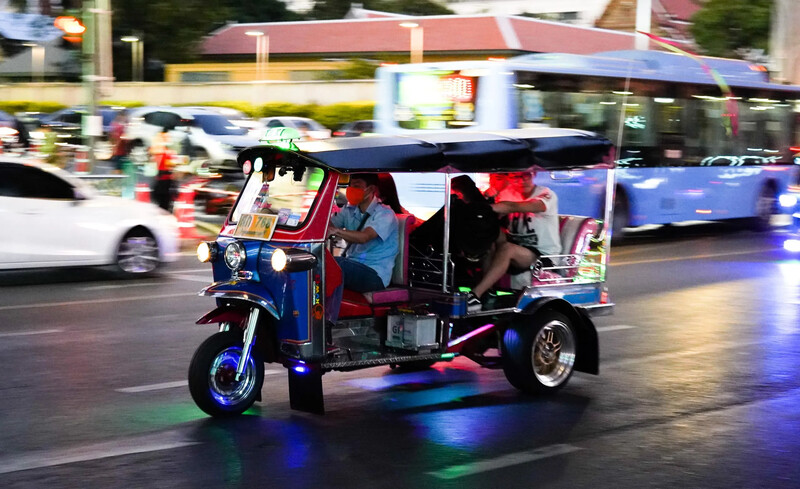 Tourists discover Bangkok by Tuk-Tuks