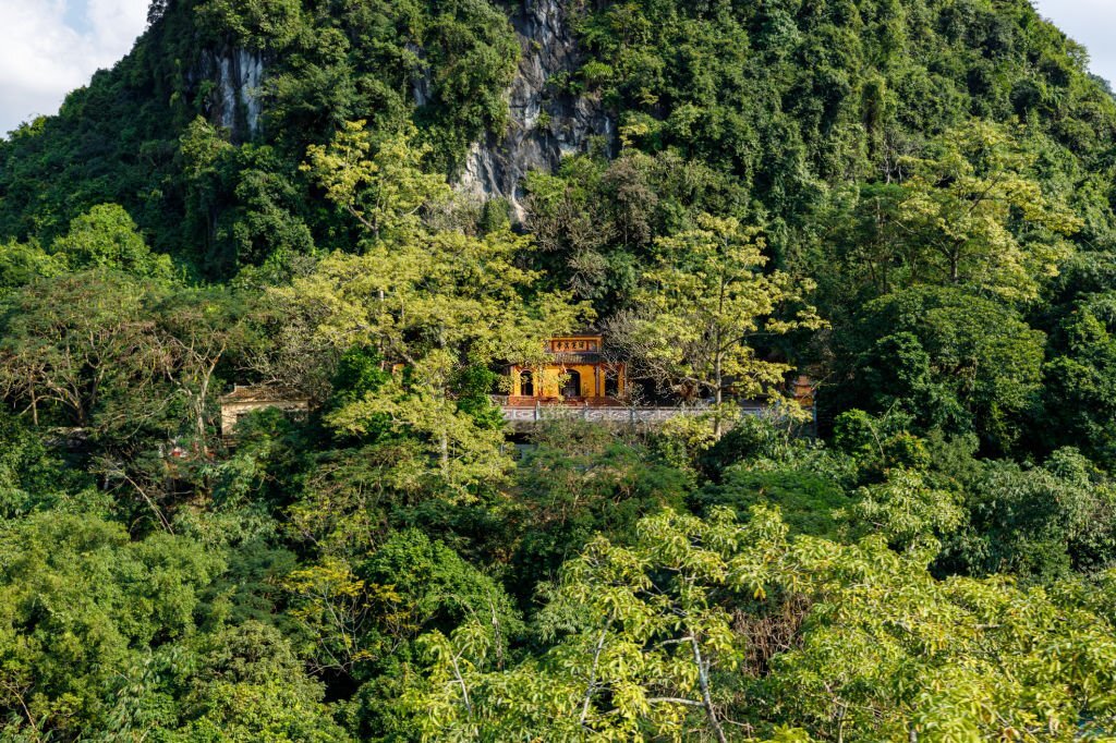 A small temple located on the limestone cliffs of Mount Huong Tich