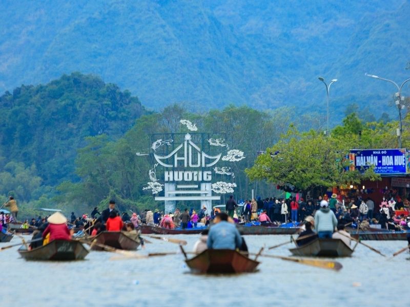 Spring pilgrims traveling to the Perfume Pagoda Festival near Hanoi