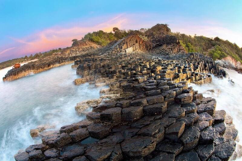 Ganh Da Dia, an impressive geological landscape formed by hexagonal basalt columns.