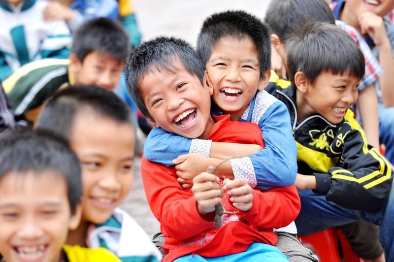 In Vietnam, warm smiles greet you everywhere, from the elderly sitting in front of their homes to the children playing in the alleyways