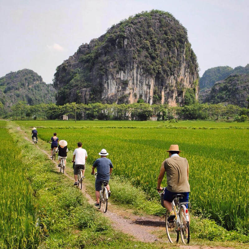 Cycling through beautiful scenery in Tam Coc