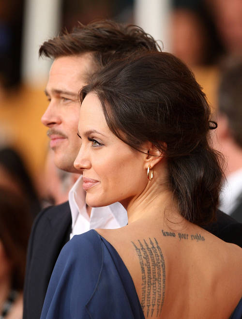 Actress Angelina Jolie with Thai Sak Yant Five Row Tattoo