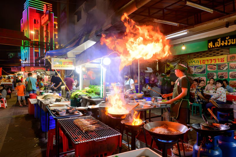 Chef in a restaurant on Yaowarat Road, Bangkok