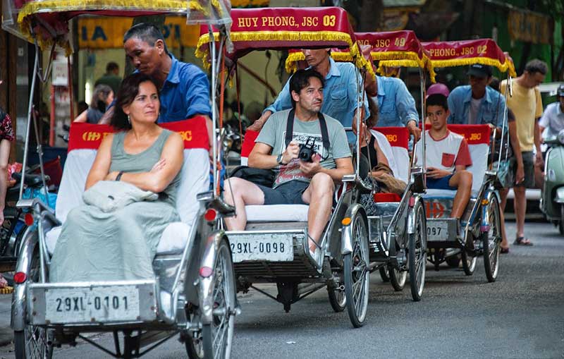 You can ride a tricycle taxi through Hanoi's Old Quarter. Photo: interne