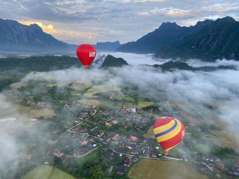 Admiring the beauty of Vang Vieng on a hot air balloon is an experience not to be missed