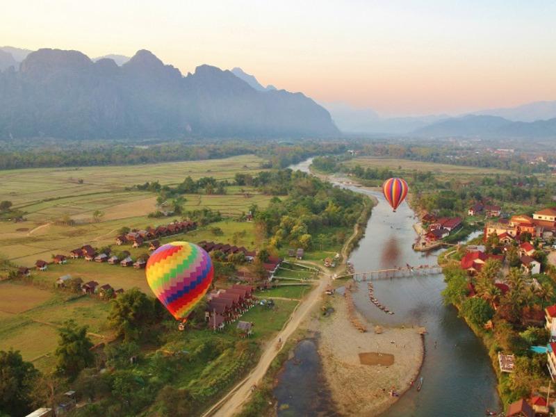 The view of Vang Vieng from above creates a sense of peace and relaxation