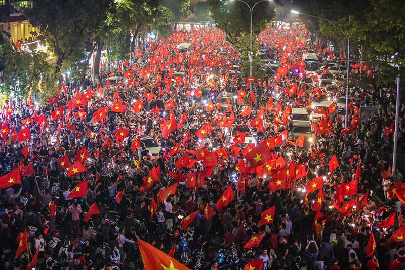 Vietnamese football fans celebrate national team victory in Hanoi in 2018