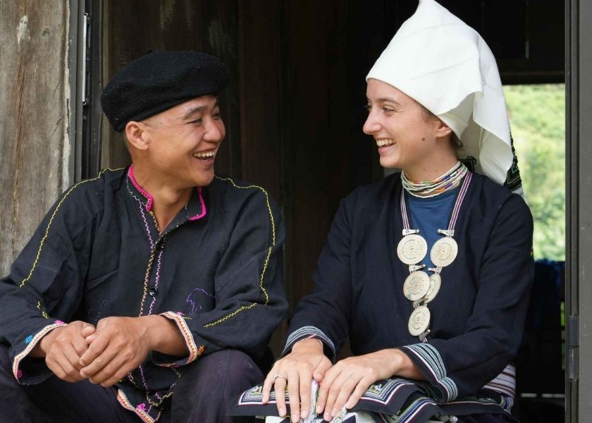 Tourists on Kampá Tour are wearing the traditional attire of the Dzao Tiền people.