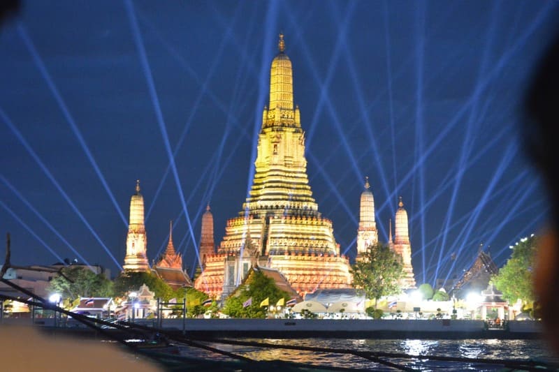 Wat Arun at night, bathed in light on the edge of the Chao Phraya