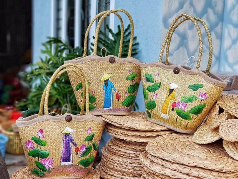 Hyacinth bags with typical image of Vietnamese woman in traditional costume
