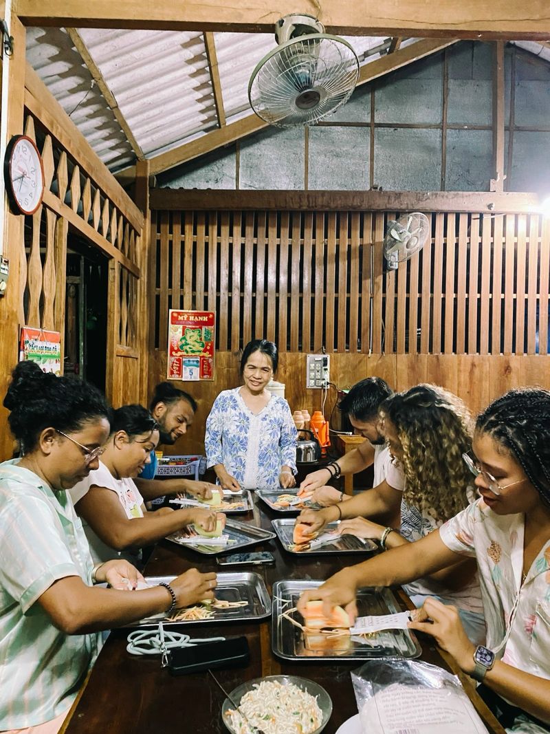 They learn how to make Vietnamese rolls