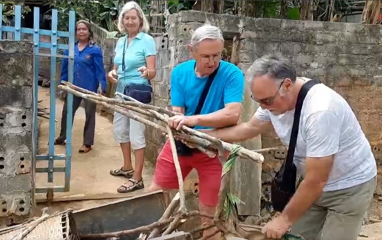 moving firewood for cooking at the homes