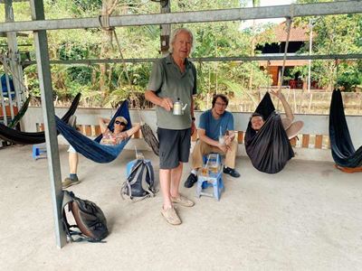 The Françoise & Claude family relaxing in hammocks prepared by the locals 