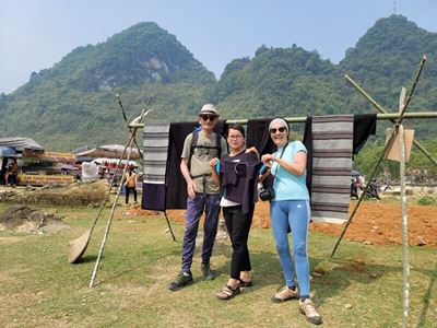 Mr. Patrick and Mrs. Marie revel in the vibrant marketplace of Pu Luong.