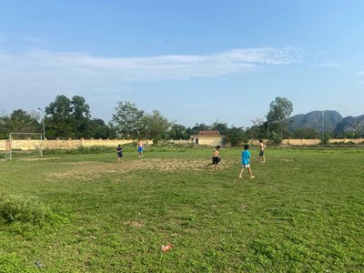 Play football with local children at Tam Coc (Halong Bay on land)
