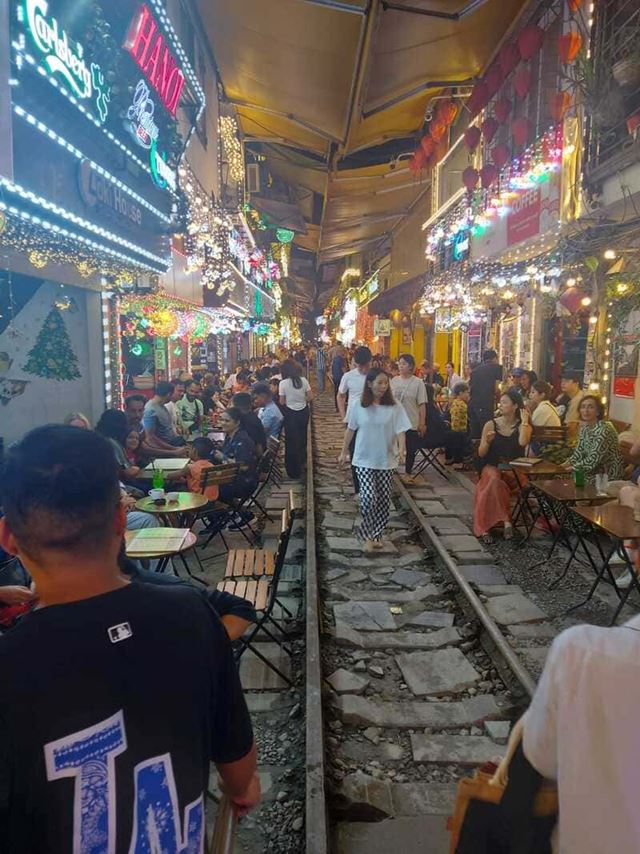 Coffee by the tracks. Only in Hanoi!