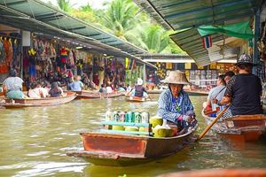 Phuket's floating markets offer tranquility amid vibrant reflections of Thai culture