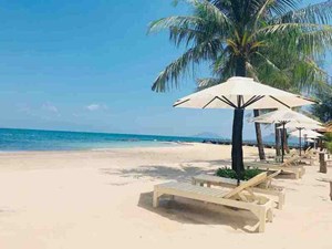 Island bliss: Relaxing moments on Phu Quoc's white sand beaches.