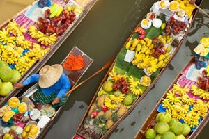 Explore the floating markets in the Mekong Delta