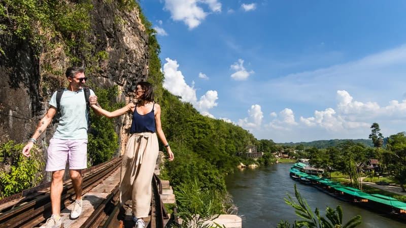 Step aboard a vintage train as it chugs along the famous Death Railway