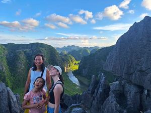 Our travelers delight in the breathtaking views of Ninh Binh with their loved ones. 